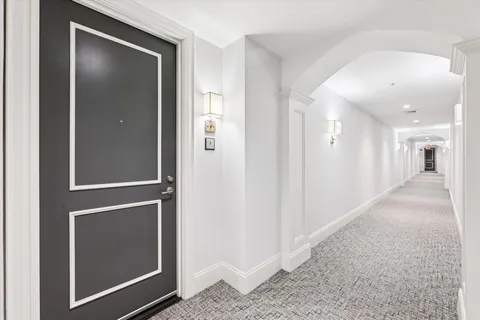 a view of an empty room and closet