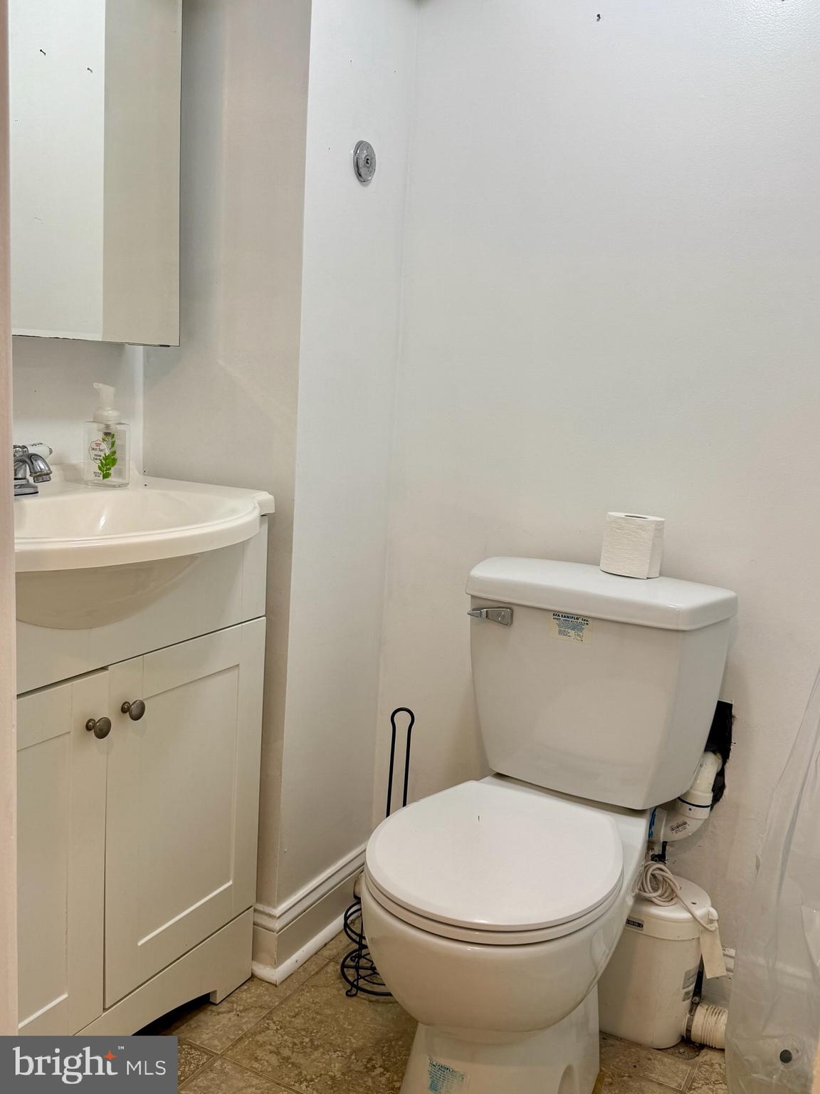 811 Earp Street Philadelphia, PA 19147 - Photo 28 of 29 a bathroom with a sink and a toilet