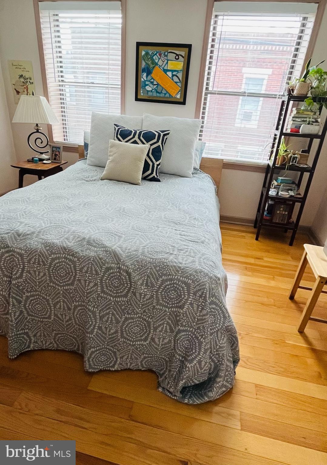 811 Earp Street Philadelphia, PA 19147 - Photo 6 of 29 a large bed sitting in a bedroom next to a window