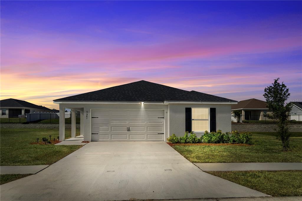961 Inverness Way Lake Lake Alfred, FL 33850 - Photo 22 of 22 front view of a house with a yard