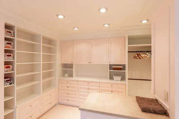 a kitchen with a refrigerator and a sink