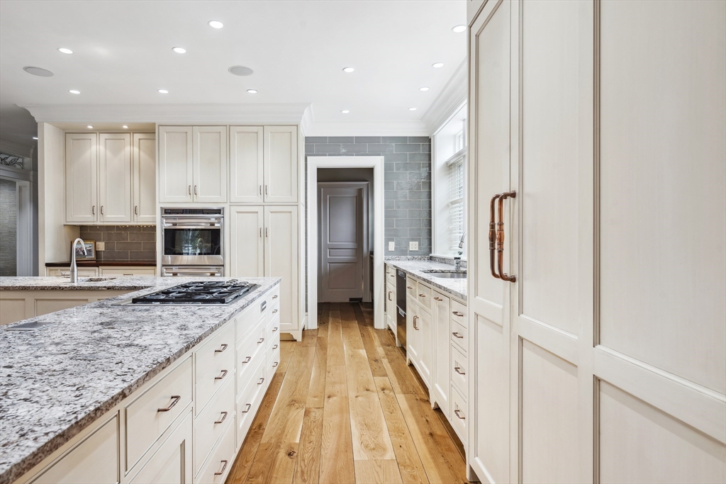 19 High Ridge Drive Mattapoisett, MA 02739 - Photo 6 of 30 a large kitchen with stainless steel appliances granite countertop a lot of counter space and wooden floor