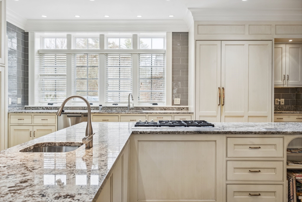 19 High Ridge Drive Mattapoisett, MA 02739 - Photo 7 of 30 a kitchen with granite countertop a sink and a stove