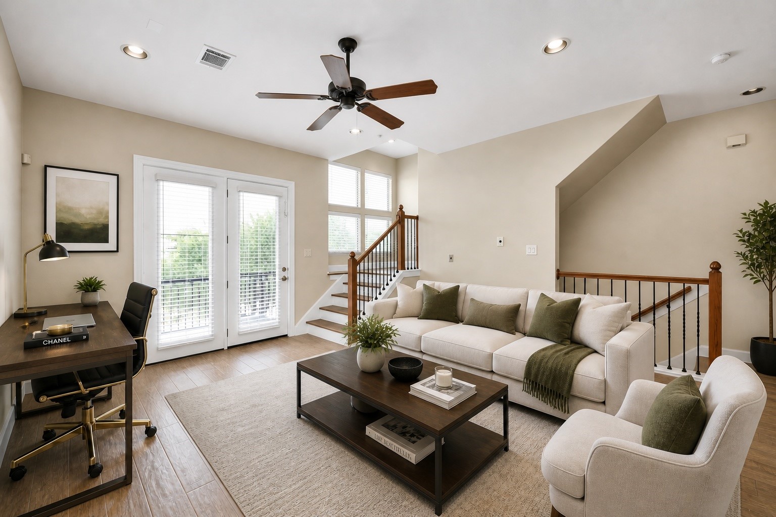 2830 Polk Street Houston, TX 77003 - Photo 8 of 21 The virtually staged main living area welcomes you with an airy layout designed for gathering and relaxing. A ceiling fan, recessed lighting, and neutral finishes keep the space bright and inviting, while French doors open to a private balcony for fresh air and peaceful views.
