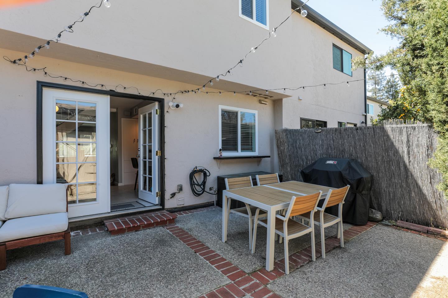 1394 North Loop Drive San Jose, CA 95126 - Photo 29 of 40 a patio with a table and chairs