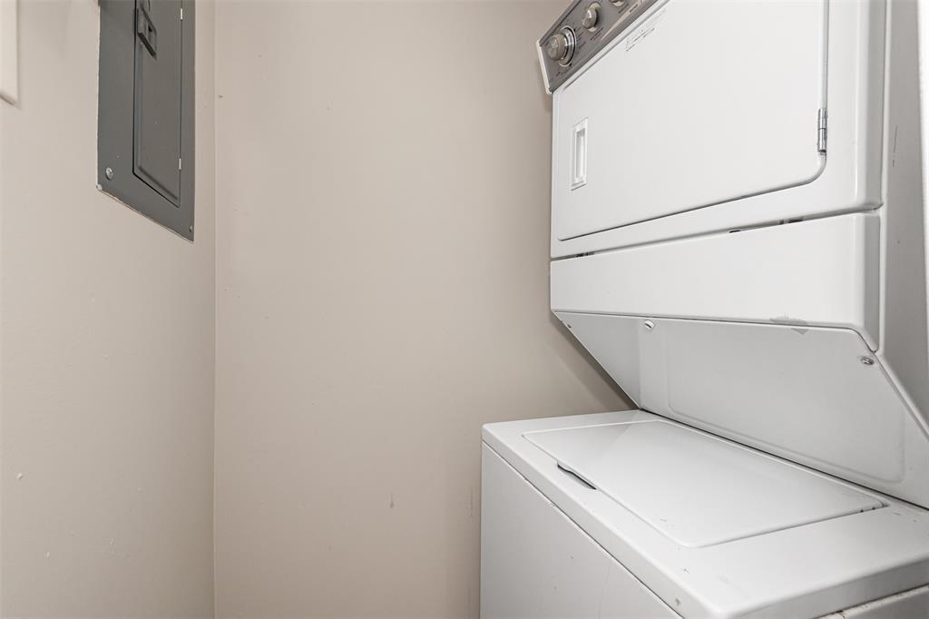 3848 Lyons Road, Unit 202 Coconut Creek, FL 33073 - Photo 15 of 32 a utility room with dryer and washer