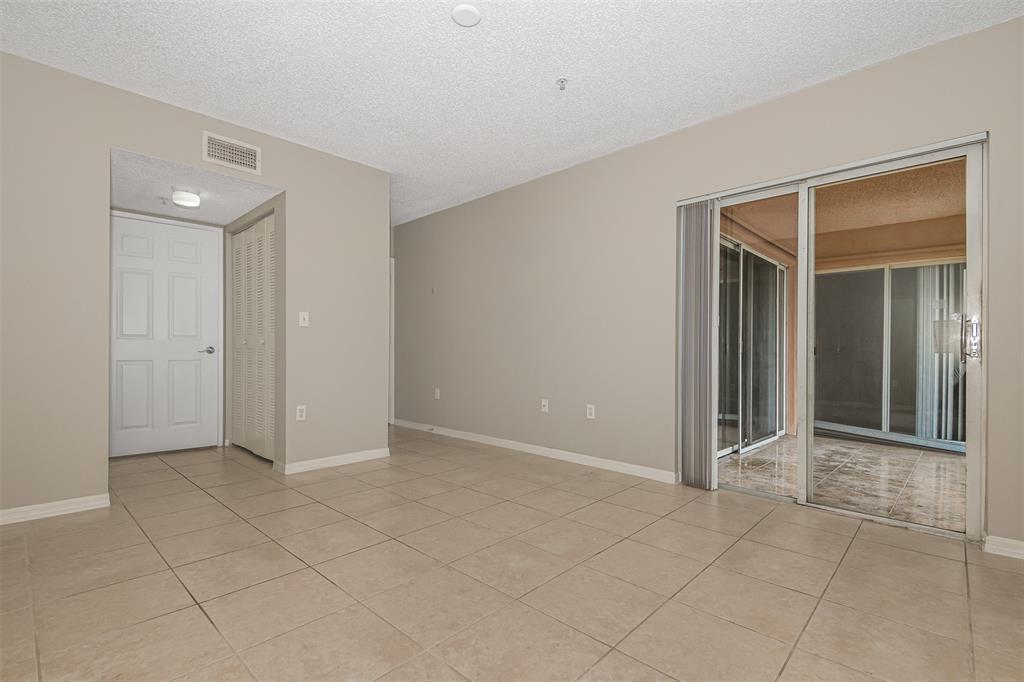 3848 Lyons Road, Unit 202 Coconut Creek, FL 33073 - Photo 24 of 32 a view of an empty room