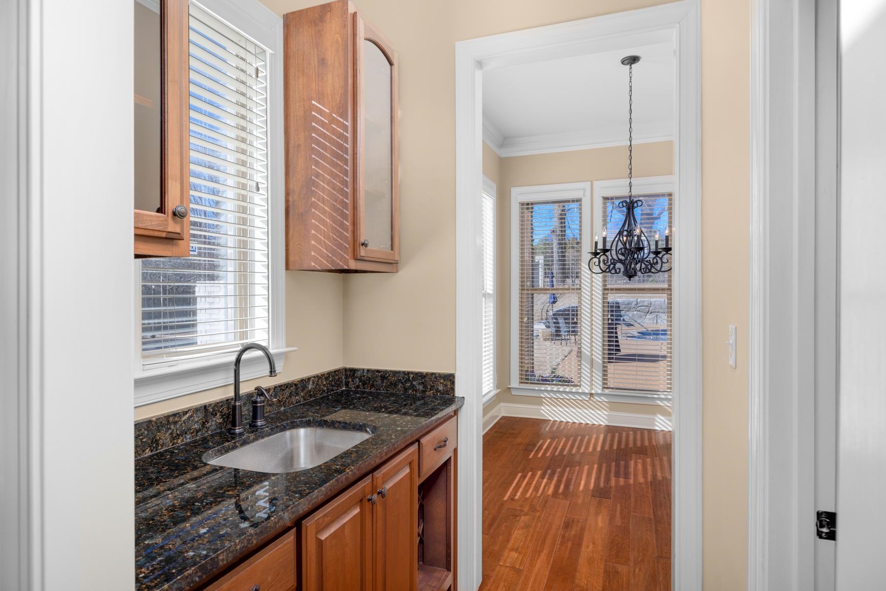 104 Eagle Trace Road Covington, TN 38019 - Photo 12 of 40 a bathroom with a granite countertop sink and a window