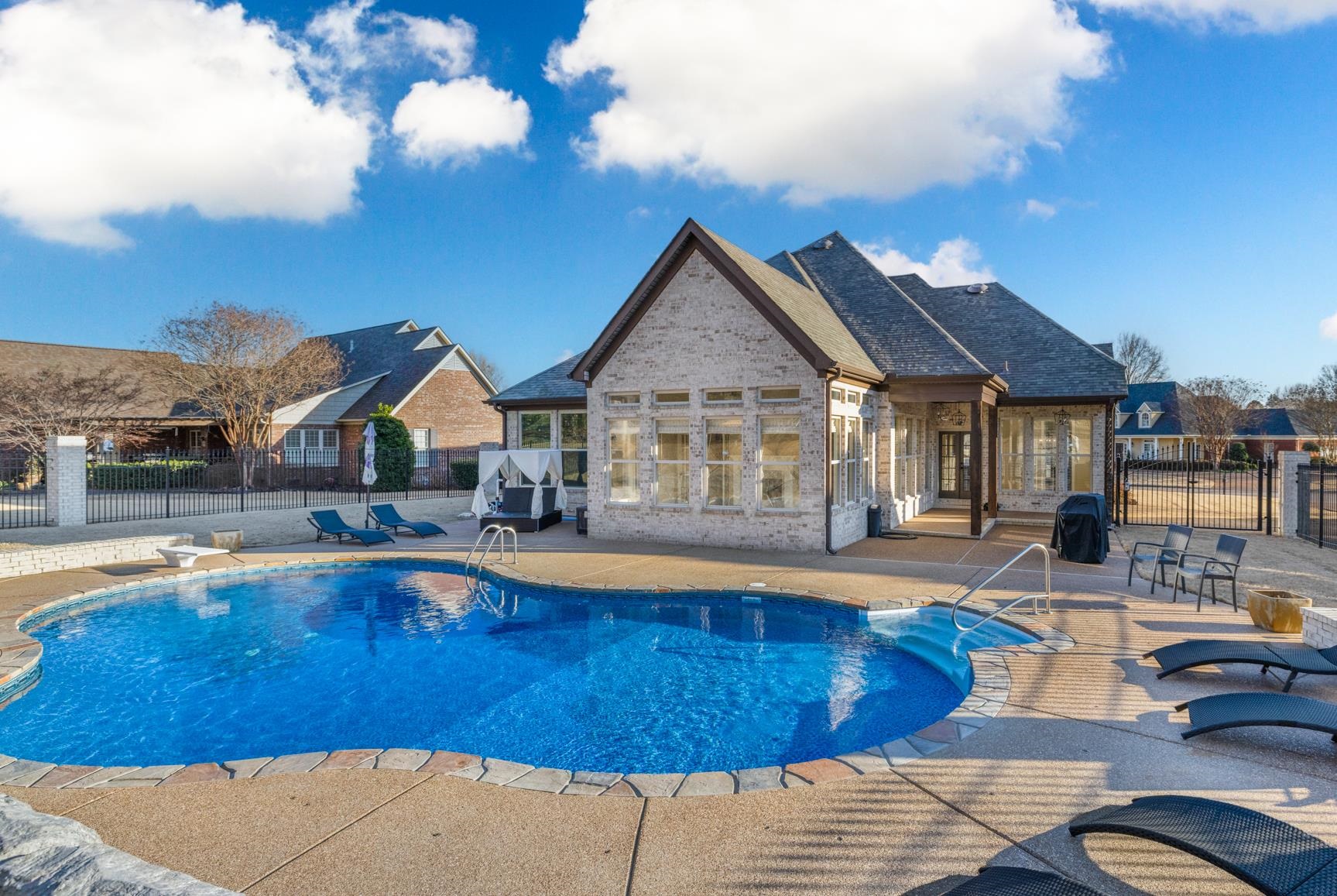 104 Eagle Trace Road Covington, TN 38019 - Photo 18 of 40 a view of a house with swimming pool and sitting area