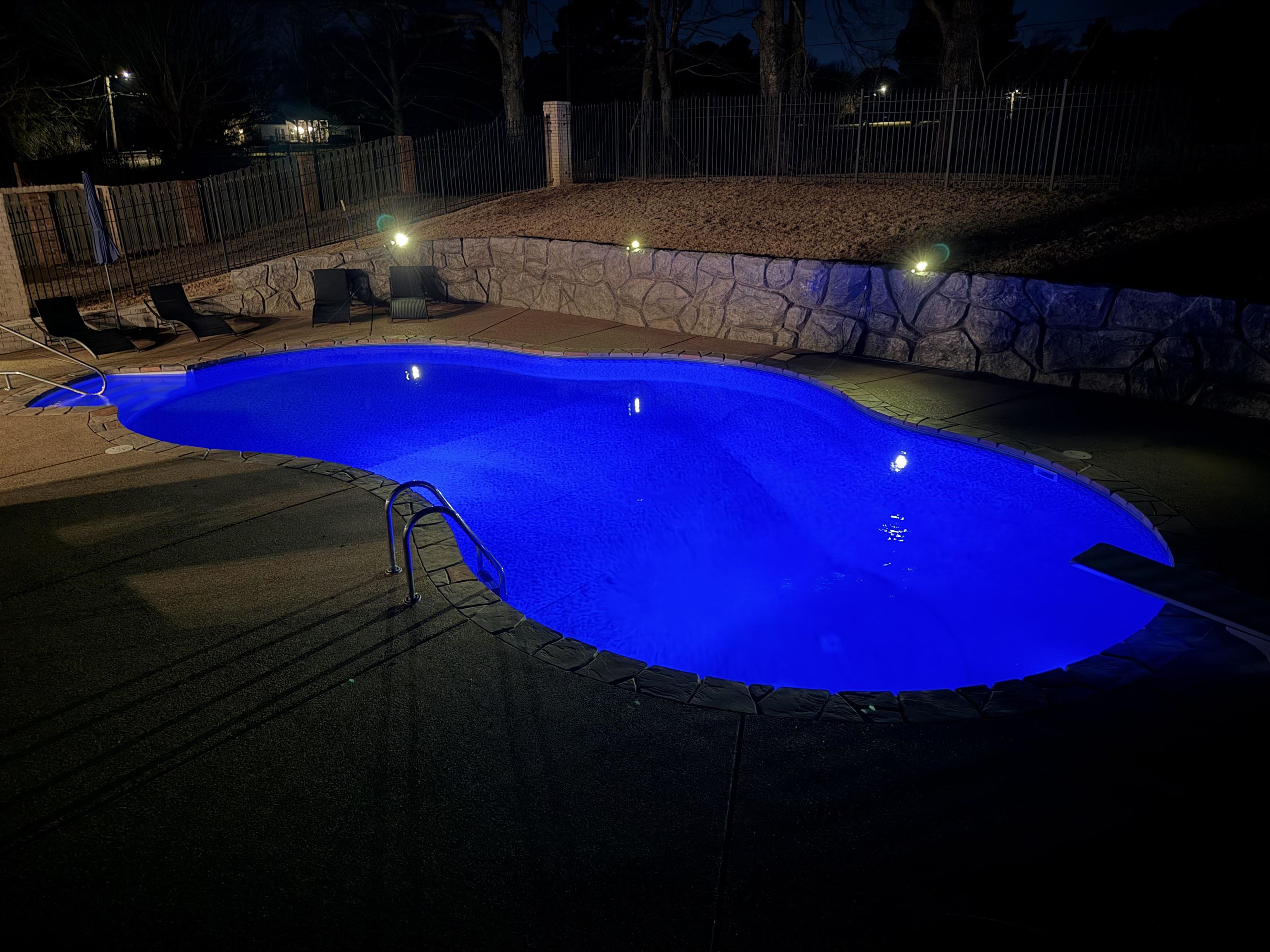 104 Eagle Trace Road Covington, TN 38019 - Photo 21 of 40 Pool at twilight with a fenced backyard, a patio, and a diving board