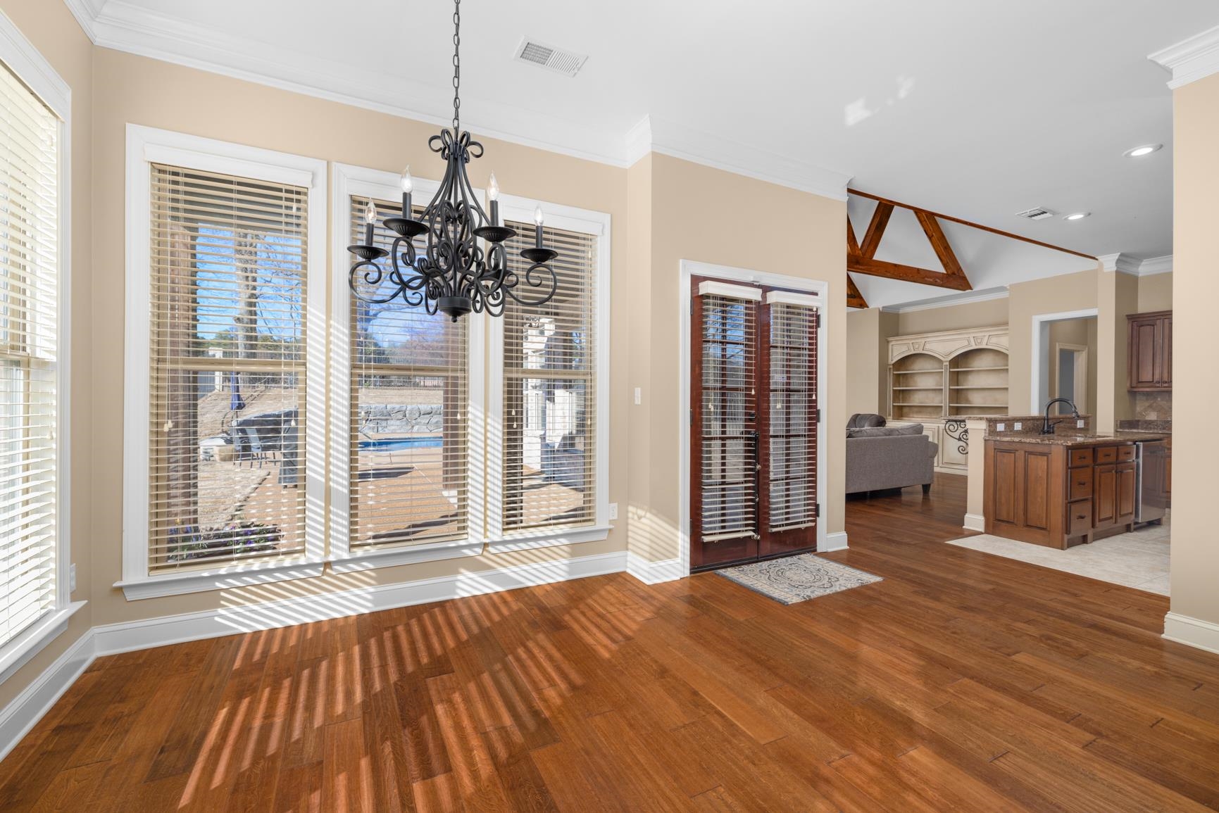 104 Eagle Trace Road Covington, TN 38019 - Photo 23 of 40 a view of a room with wooden floor stairs and a living room