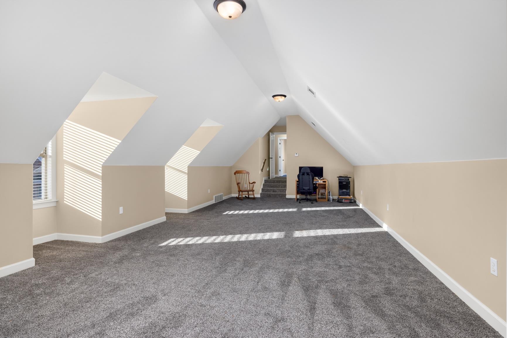104 Eagle Trace Road Covington, TN 38019 - Photo 28 of 40 Bonus room with dark colored carpet and baseboards