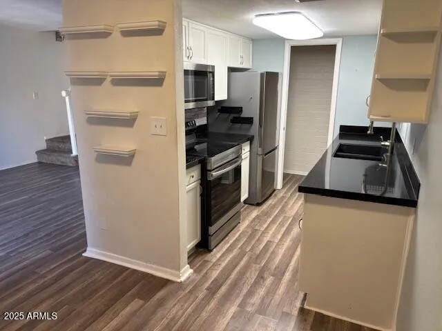 a view of a room with racks on the wall