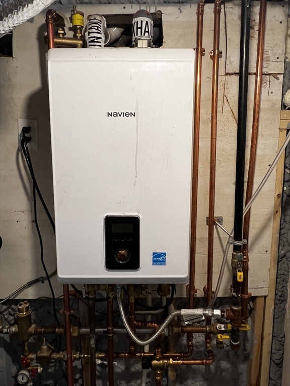 56 Pelham Street Methuen, MA 01844 - Photo 22 of 27 with a refrigerator freezer sitting inside of a kitchen