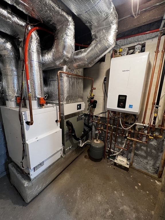 56 Pelham Street Methuen, MA 01844 - Photo 23 of 27 a view of a room with gym equipment