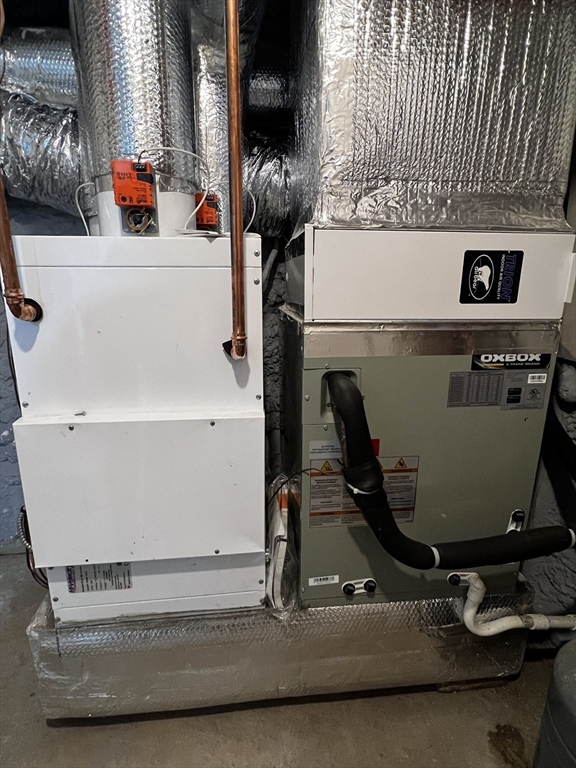 56 Pelham Street Methuen, MA 01844 - Photo 24 of 27 a room with a washing machine