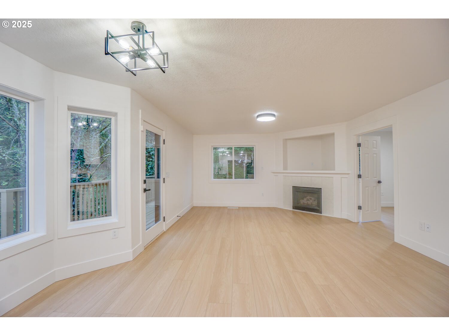 3704 Northwest Orchard Court Camas, WA 98607 - Photo 11 of 33 a view of empty room with a fireplace