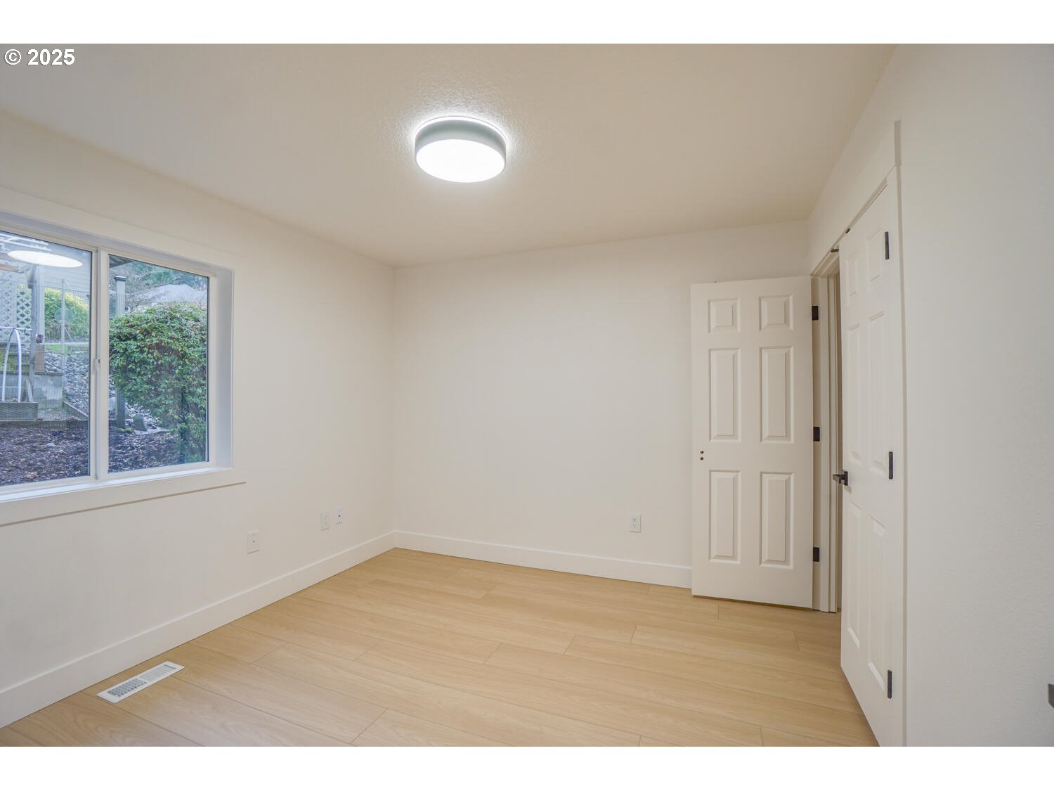 3704 Northwest Orchard Court Camas, WA 98607 - Photo 15 of 33 a view of an empty room with a window