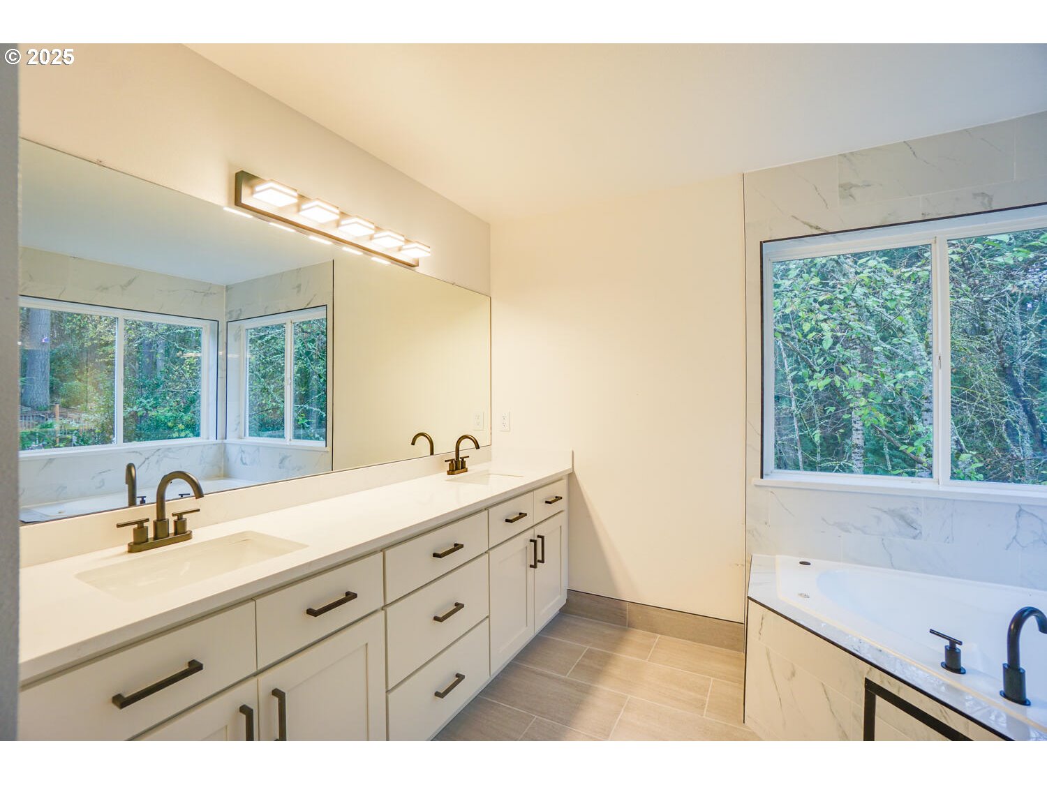 3704 Northwest Orchard Court Camas, WA 98607 - Photo 21 of 33 a bathroom with a sink double vanity and a mirror