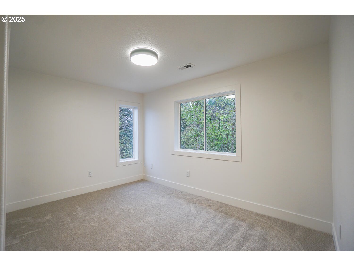 3704 Northwest Orchard Court Camas, WA 98607 - Photo 25 of 33 a view of an empty room with a window