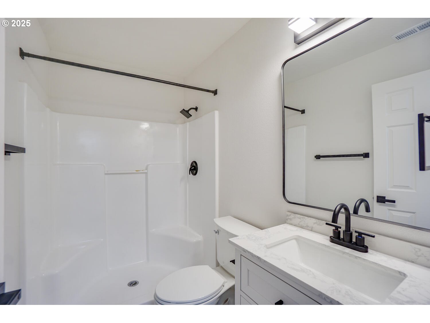 3704 Northwest Orchard Court Camas, WA 98607 - Photo 29 of 33 a bathroom with a sink a toilet and shower