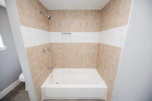 a bathroom with a bathtub