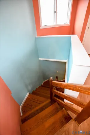 a room with a bed and a window
