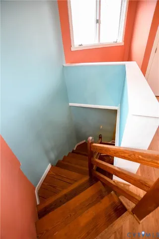 a room with a bed and a window