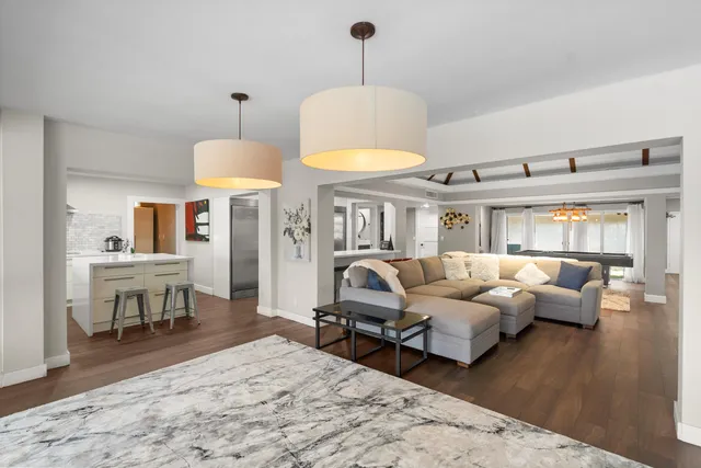 a view of center kitchen island attached withe living room