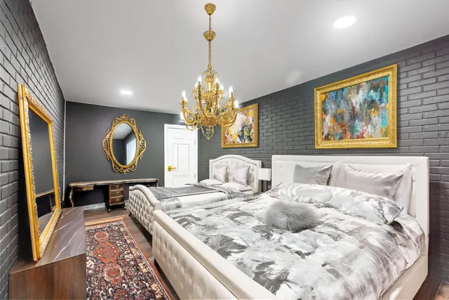 an aerial view of residential house with outdoor space and swimming pool