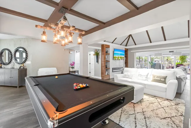 a large kitchen with a chandelier