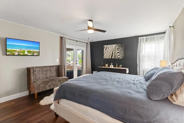 an aerial view of residential house with outdoor space and swimming pool