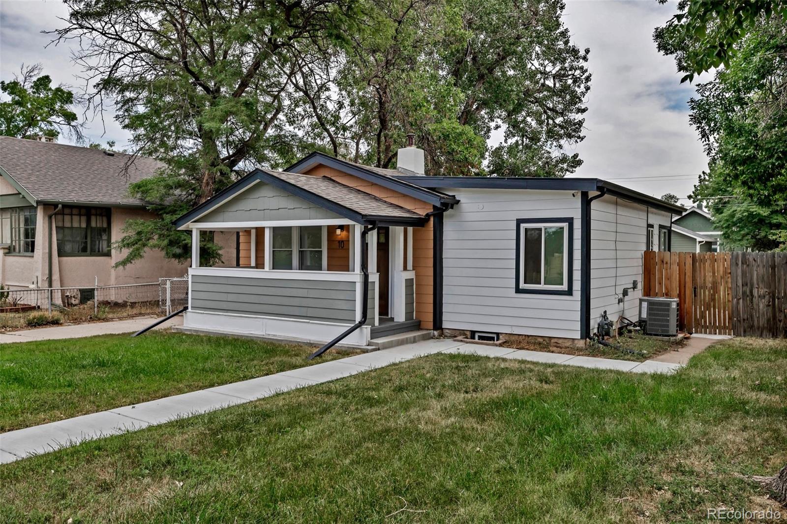 10 South Irving Street Denver, CO 80219 - Photo 4 of 35 a house view with a garden space