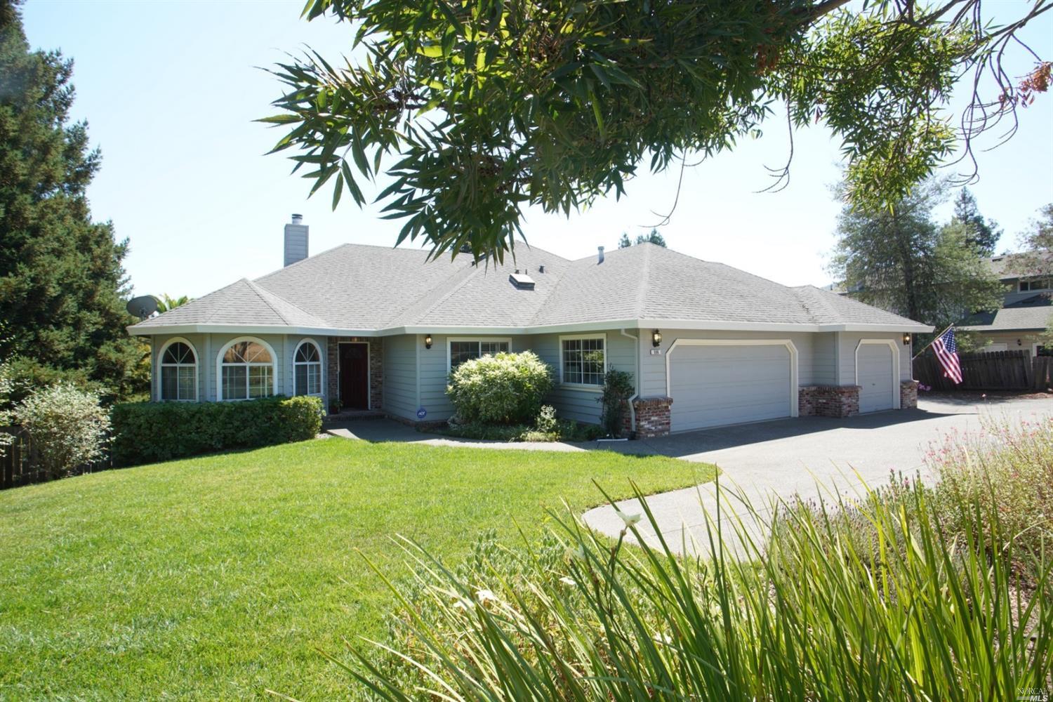506 Los Alamos Road Santa Rosa, CA 95409 - Photo 1 of 1 a front view of a house with a yard and garage