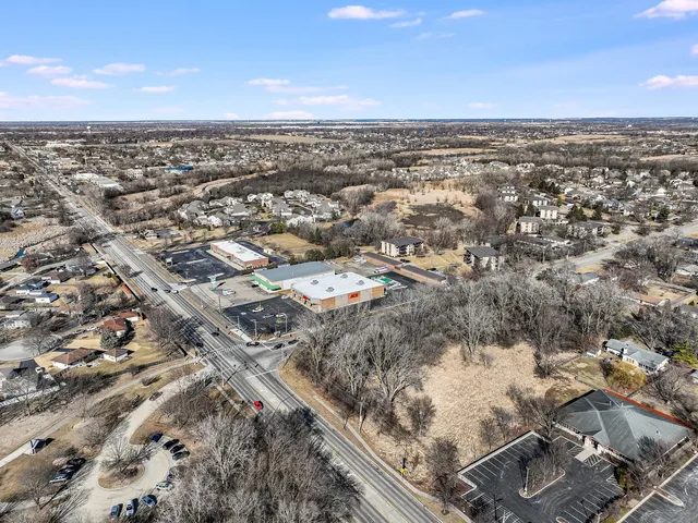 an aerial view of residential building with parking space