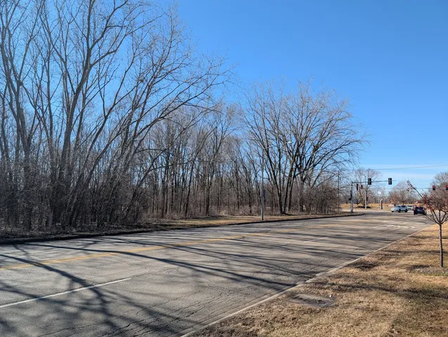 a view of city and trees