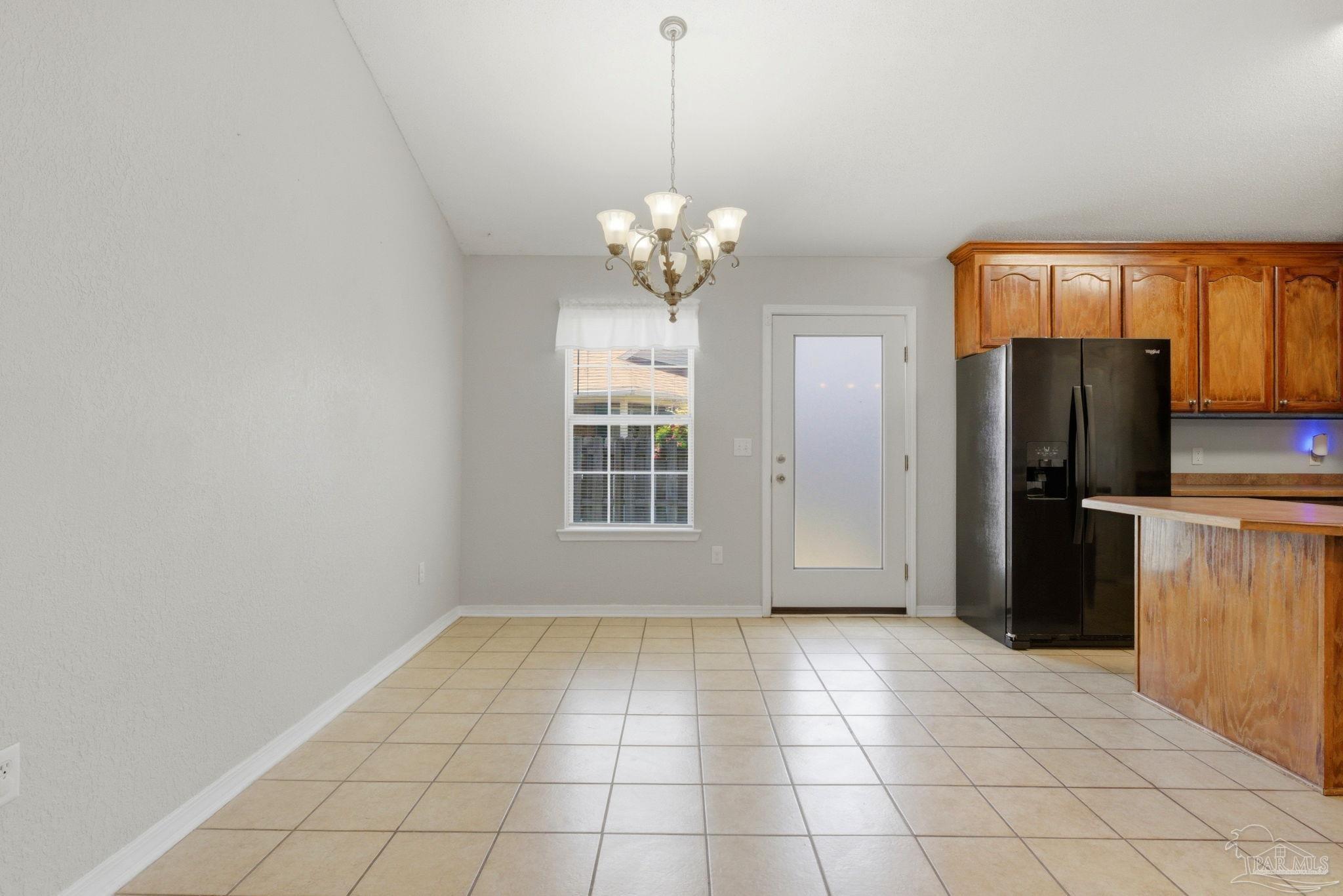 8100 Castle Pointe Way Pensacola, FL 32506 - Photo 14 of 44 a view of an empty room with a window