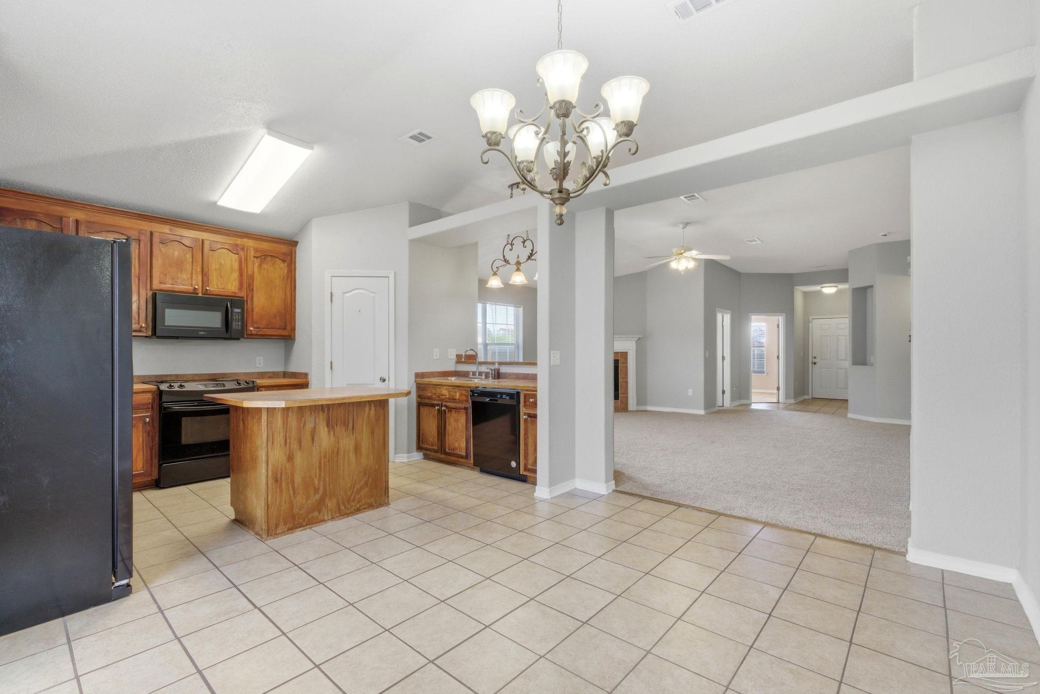 8100 Castle Pointe Way Pensacola, FL 32506 - Photo 15 of 44 a large kitchen with cabinets and stainless steel appliances