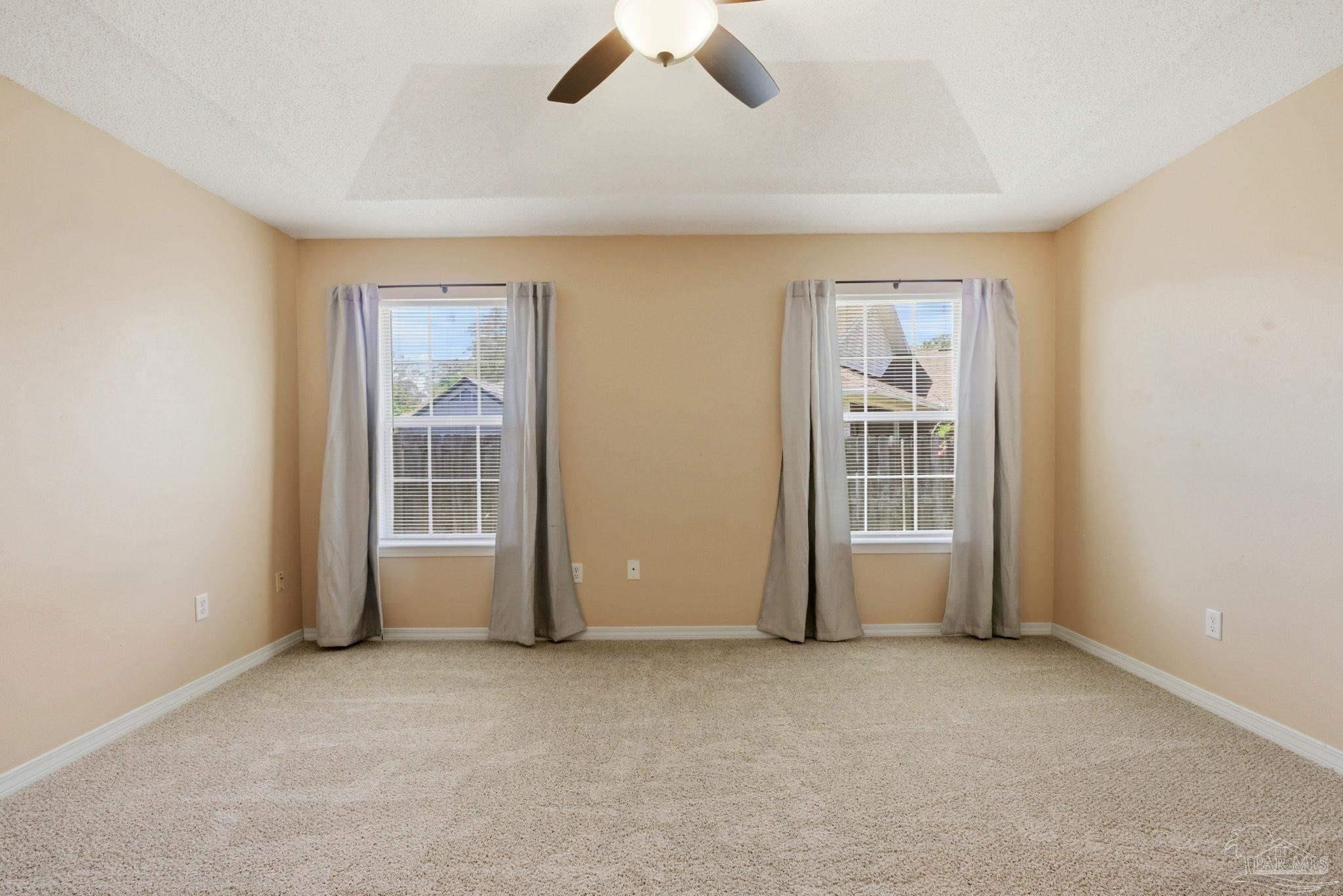 8100 Castle Pointe Way Pensacola, FL 32506 - Photo 22 of 44 an empty room with windows