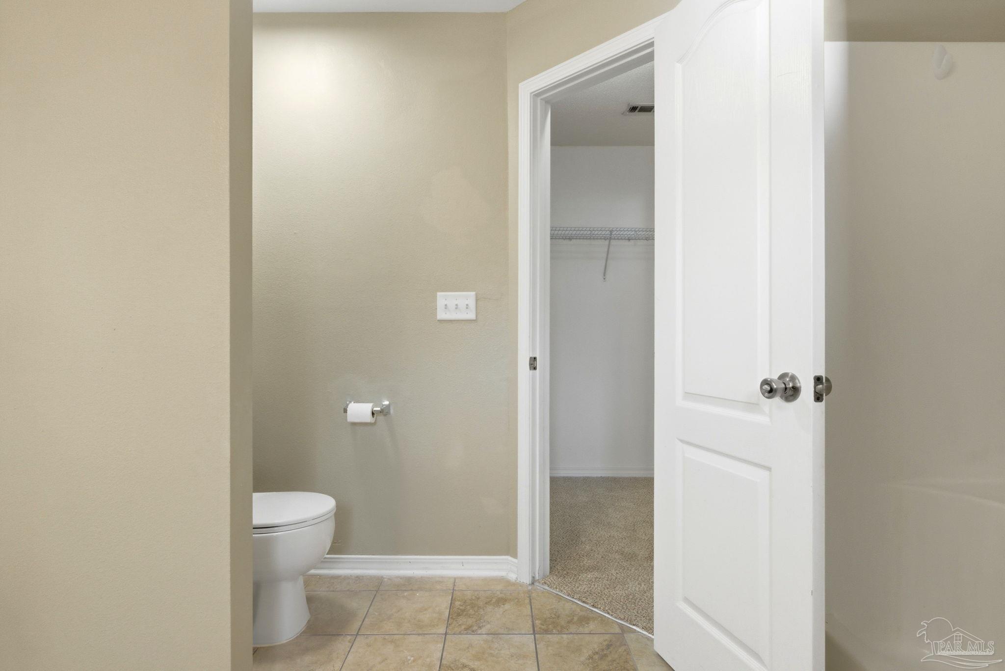 8100 Castle Pointe Way Pensacola, FL 32506 - Photo 31 of 44 a bathroom with a granite countertop sink