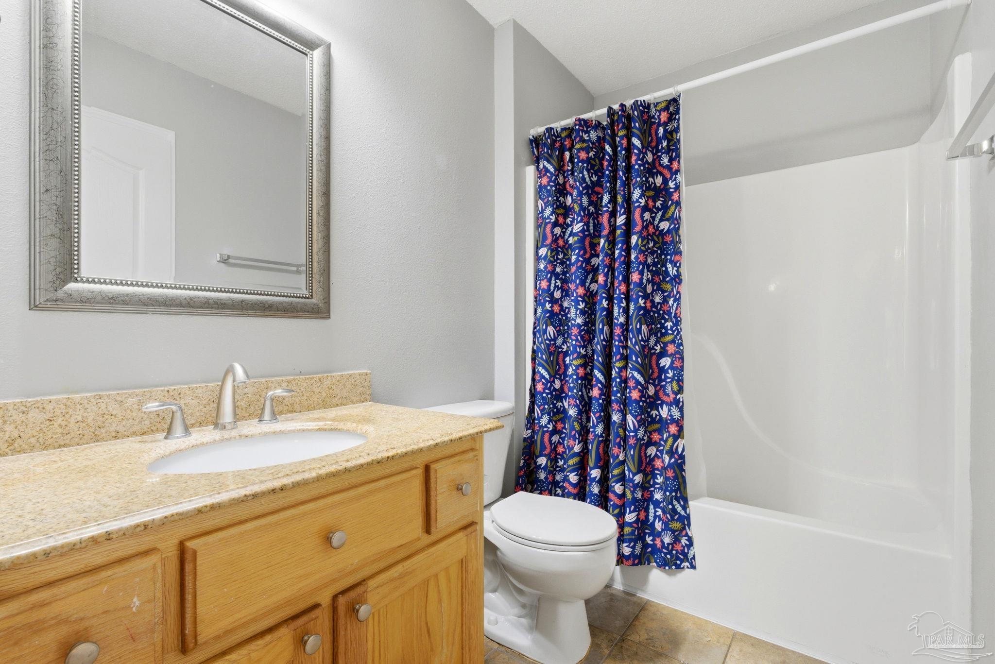 8100 Castle Pointe Way Pensacola, FL 32506 - Photo 35 of 44 a bathroom with a sink toilet and shower