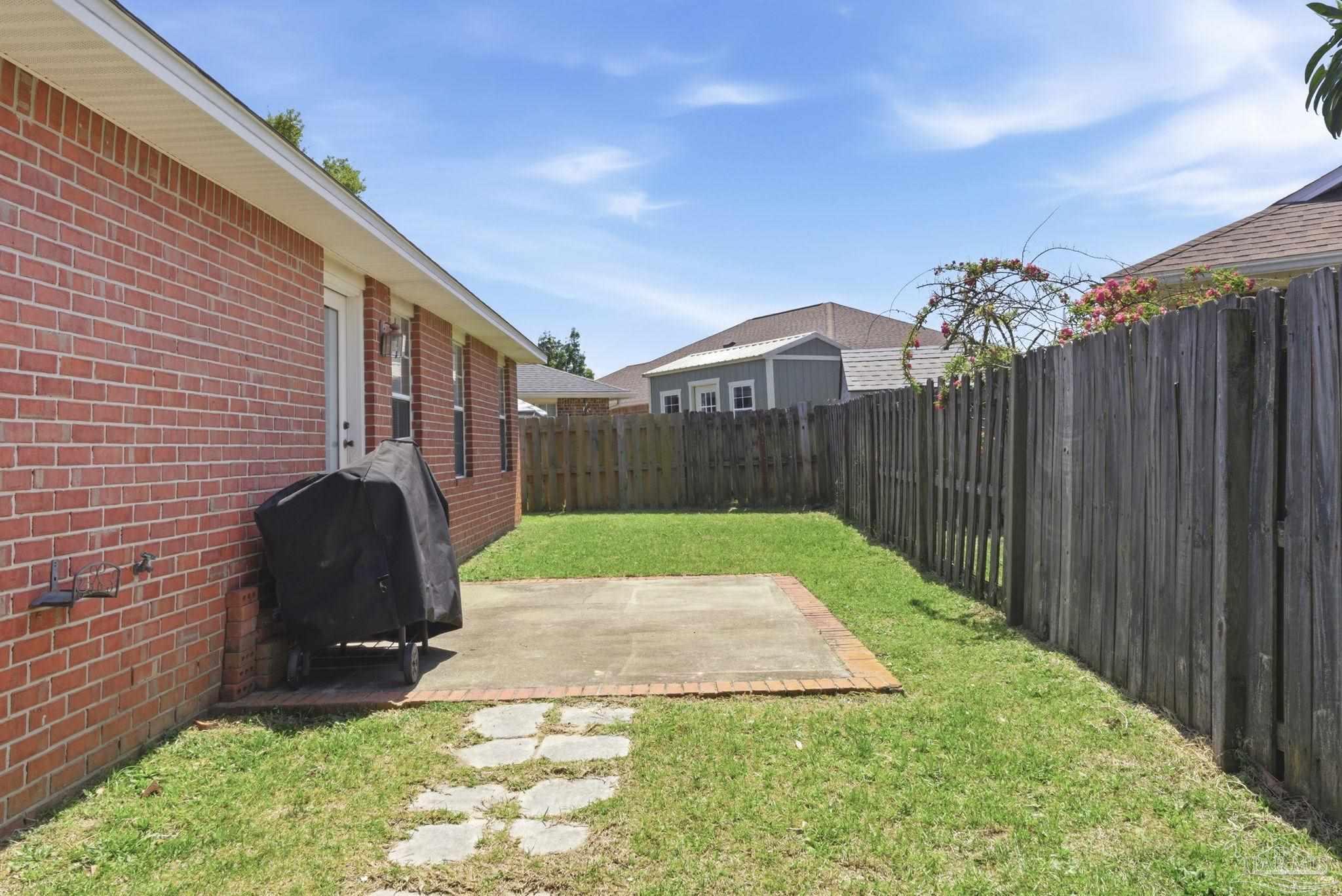 8100 Castle Pointe Way Pensacola, FL 32506 - Photo 41 of 44 a view of a back yard