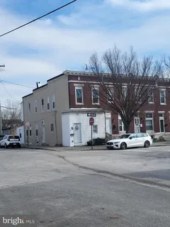 a view of a building with a road