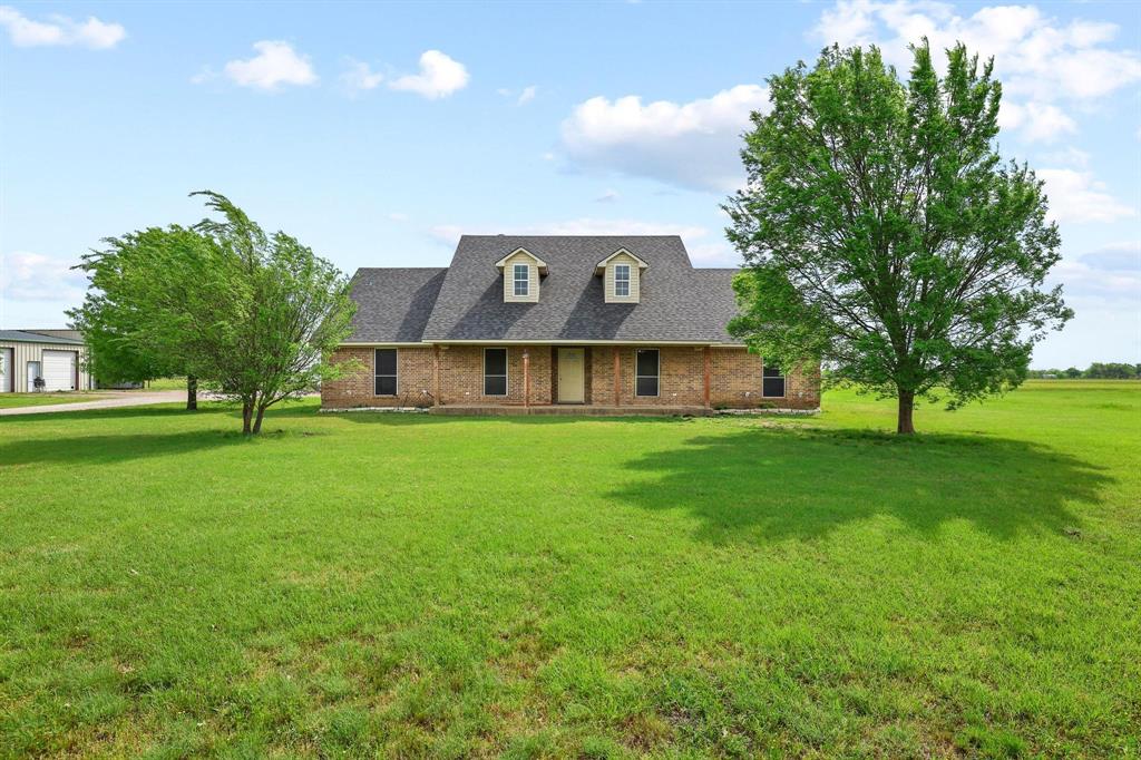 386 Scoggins Road Tioga, TX 76271 - Photo 2 of 30 a front view of house with yard and green space