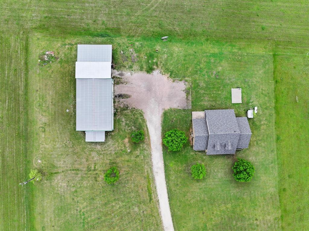 386 Scoggins Road Tioga, TX 76271 - Photo 3 of 30 view of a house with a yard