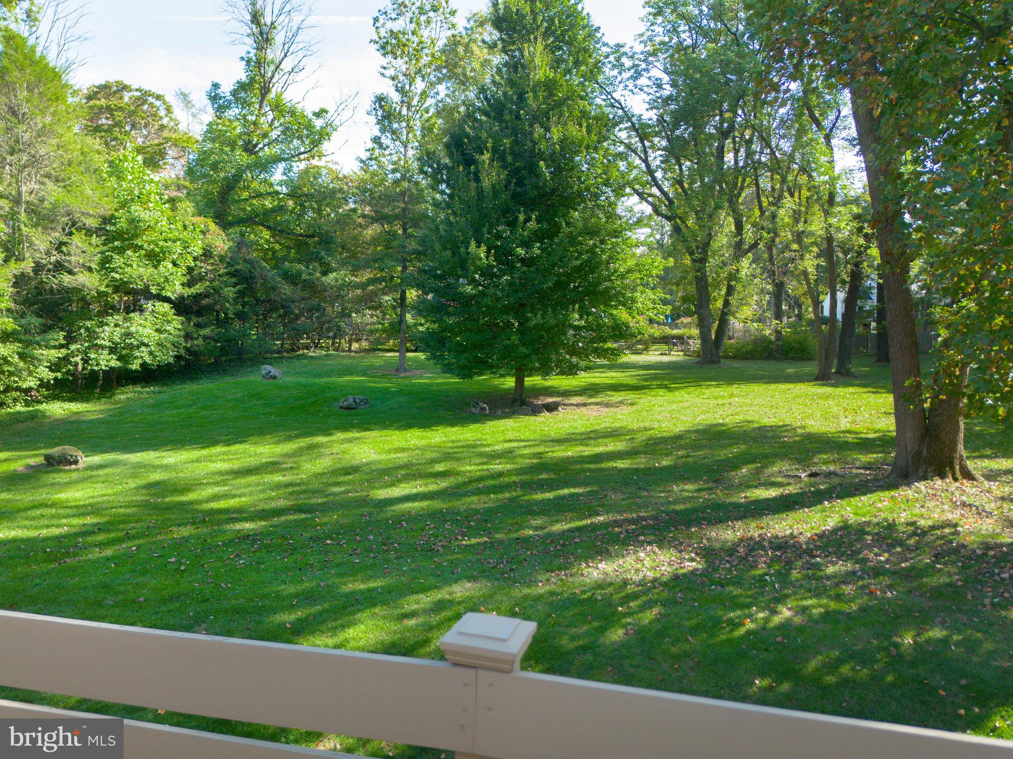 1345 Valley Road Villanova, PA 19085 - Photo 14 of 60 a view of a grassy field with trees