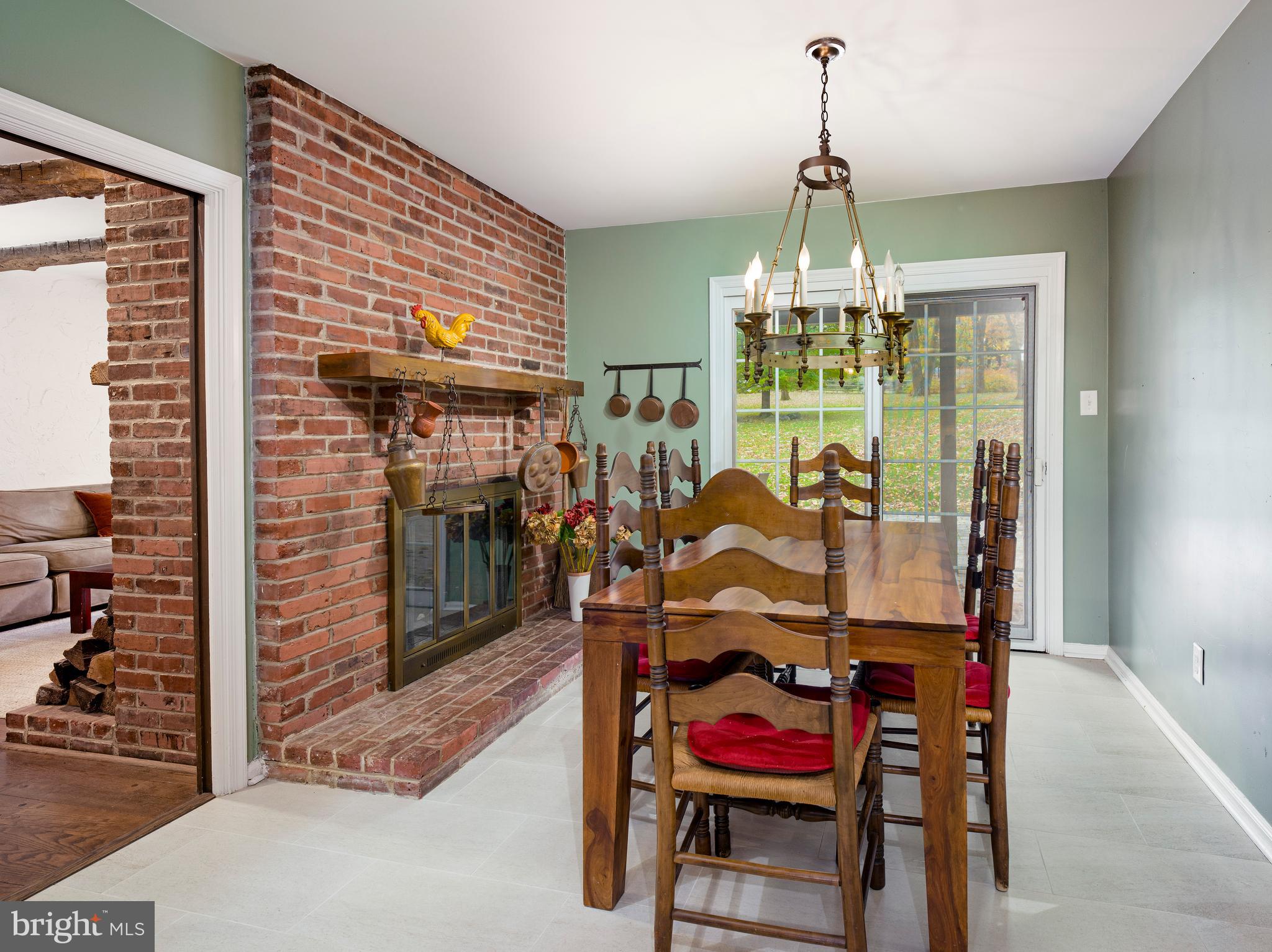 1345 Valley Road Villanova, PA 19085 - Photo 35 of 60 a dining room with furniture a chandelier and window