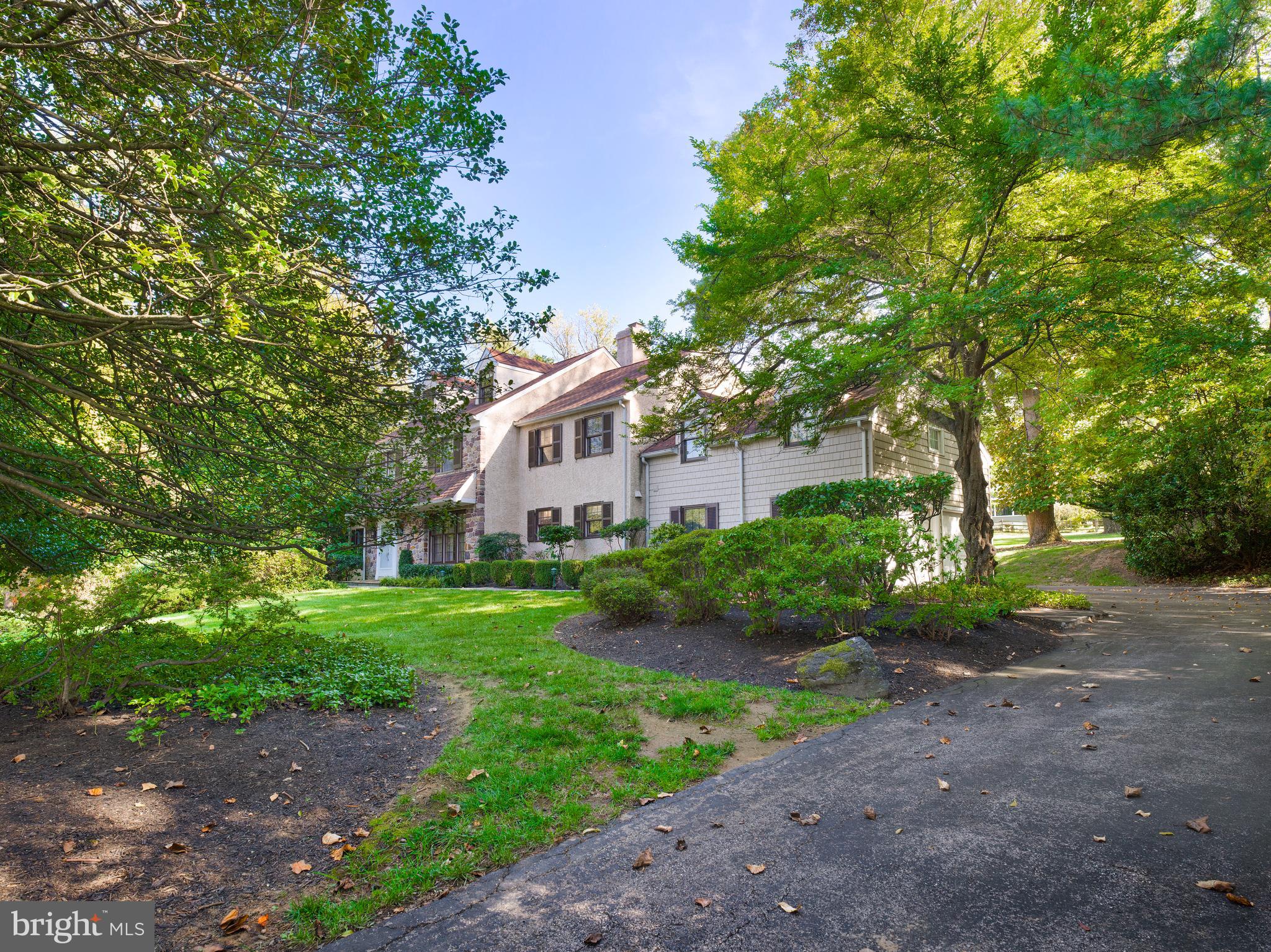 1345 Valley Road Villanova, PA 19085 - Photo 4 of 60 a front view of a house with garden