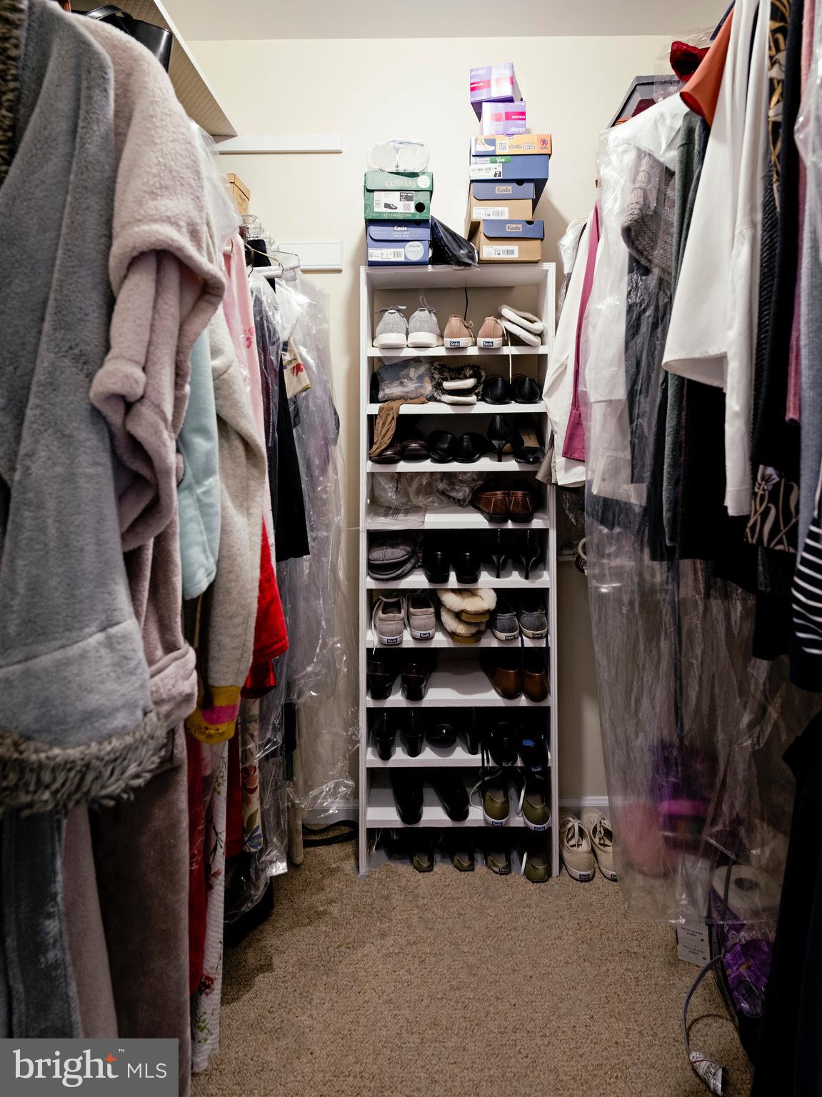 1345 Valley Road Villanova, PA 19085 - Photo 48 of 60 a view of walk in closet with clothes and shoes