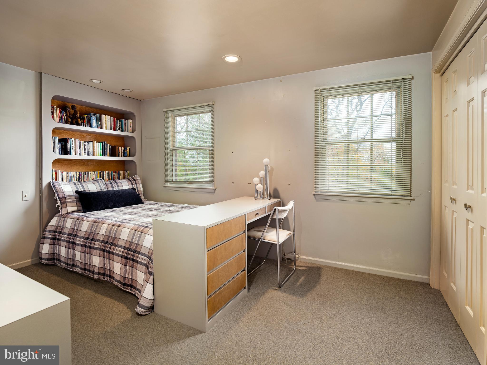 1345 Valley Road Villanova, PA 19085 - Photo 54 of 60 a bedroom with a bed and a book shelf